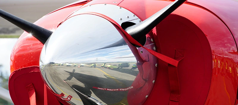 Reflected image in the front propeller of P2-AFD